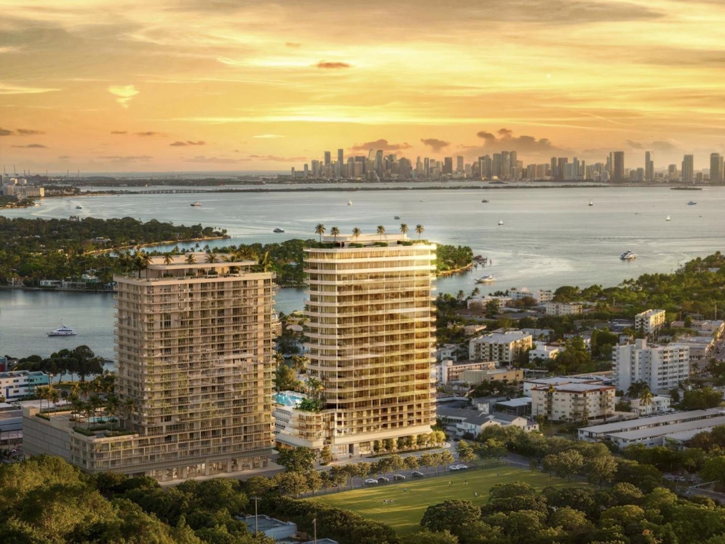72 Carlyle Miami Beach official aerial rendering, 20-story North Beach tower at 600 72nd Street with Biscayne Bay and the downtown Miami skyline behind