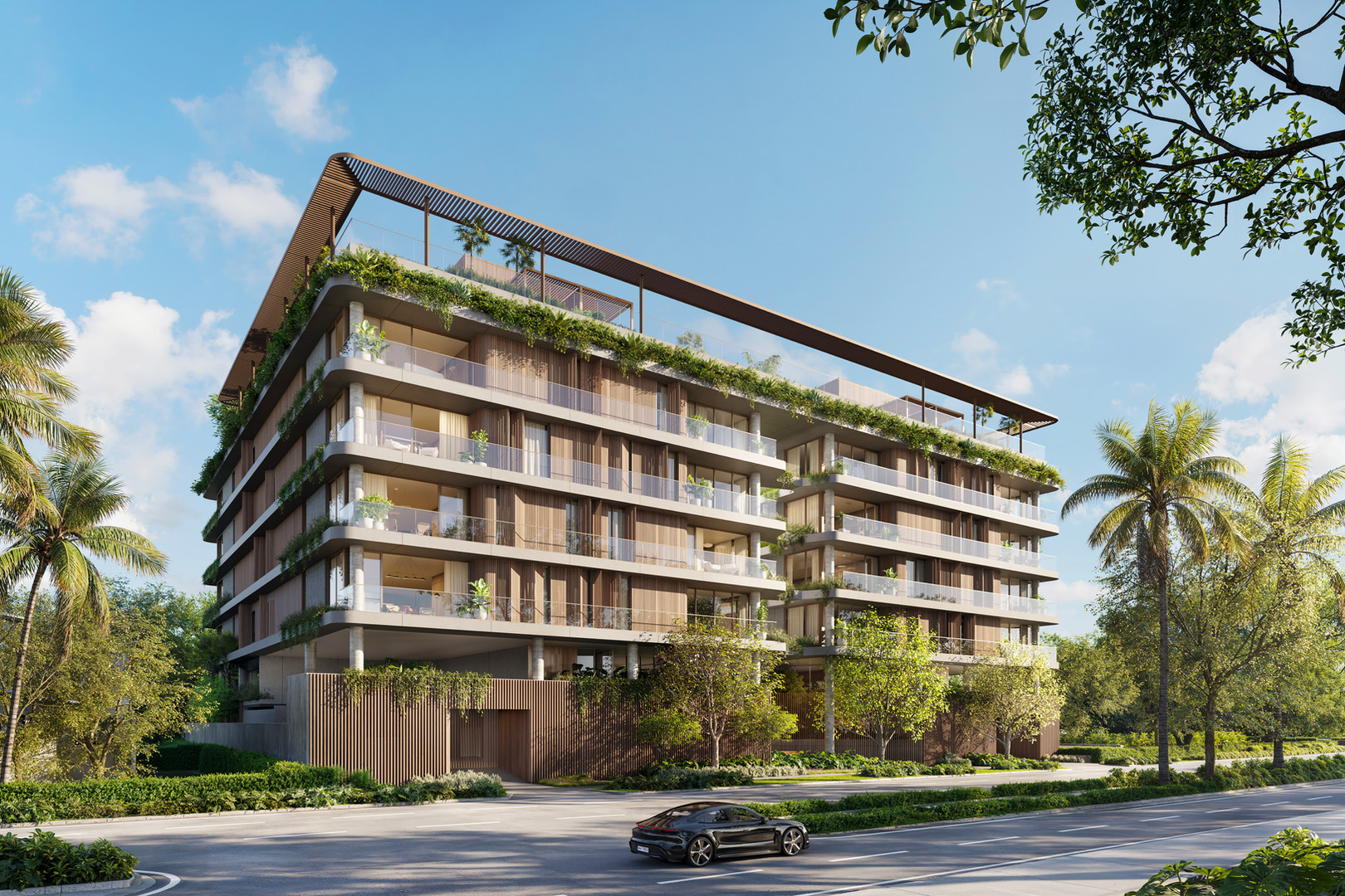 Render de la entrada a nivel de calle de Colette Residences con palmeras y acceso vehicular en South Brickell