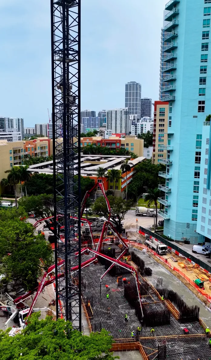 Edge House Miami foundation pour seen past the tower crane mast, 1837 NE 4th Ave Edgewater