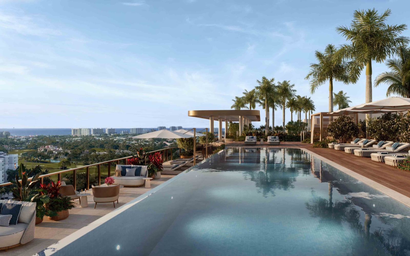 Renderizado de la piscina infinita en la azotea de Mr. C Residences Boca Raton con cabanas, sillas de descanso y palmeras
