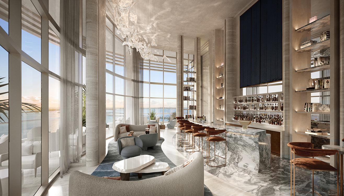 St. Regis Residences private library bar lounge with extensive book collection