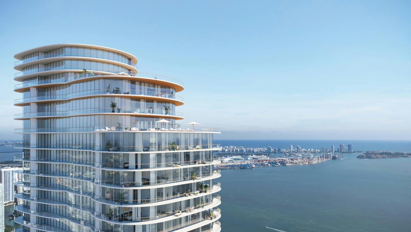 Renderizado de la corona y los pisos superiores de la torre con forma de diamante de OMA en The Perigon Miami Beach al atardecer