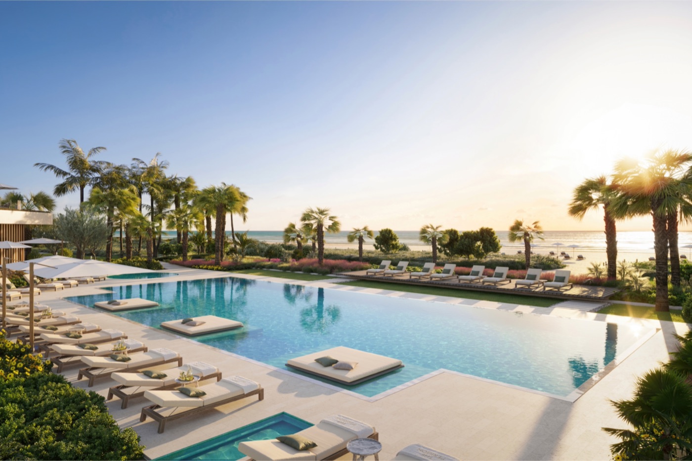 Renderizado de la piscina frente al mar y cubierta de cabañas de The Perigon Miami Beach con vistas al Atlántico