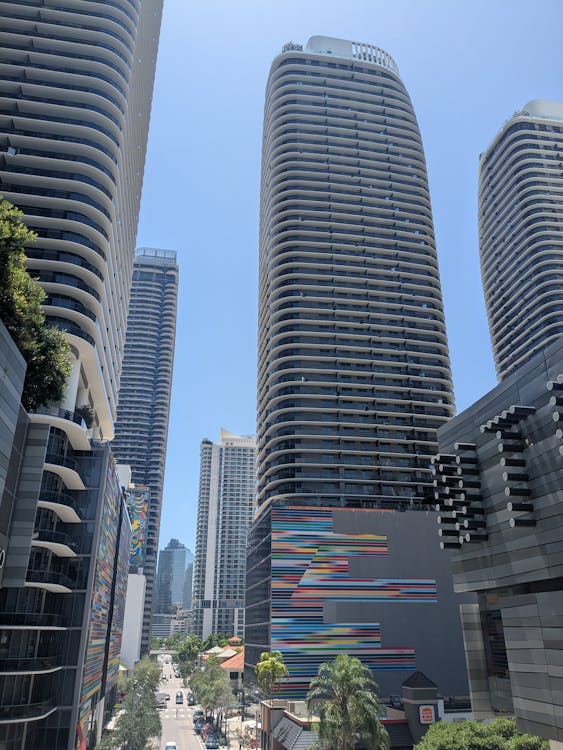 Modern luxury skyscrapers in Downtown Miami Brickell reflecting the St. Regis branded residence market
