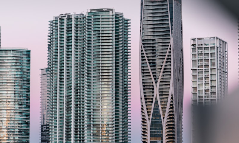 Luxury oceanfront condominiums along the Miami and Surfside coastline at dusk