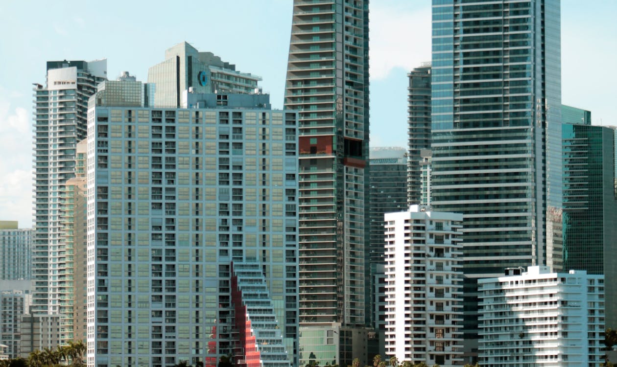Brickell luxury condo skyline in May 2026 illustrating Miami-Dade's eighth consecutive month of home-sales growth and the 25 percent YoY surge in $5M-plus closings