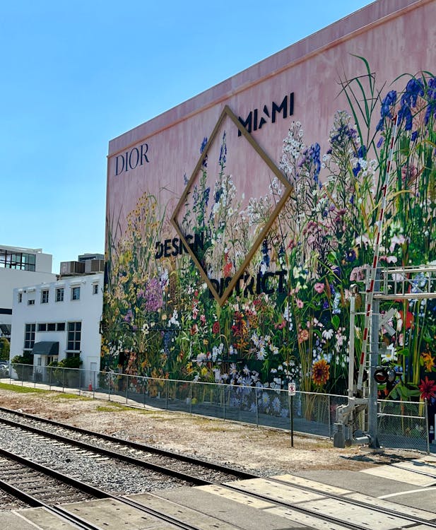 Miami Design District street scene with the Dior x Design District floral mural near the future Kempinski Residences Miami Design District site at 3801 and 3883 Biscayne Boulevard, where DaGrosa Capital is delivering Kempinski's first U.S. residential project with Rockwell Group interiors