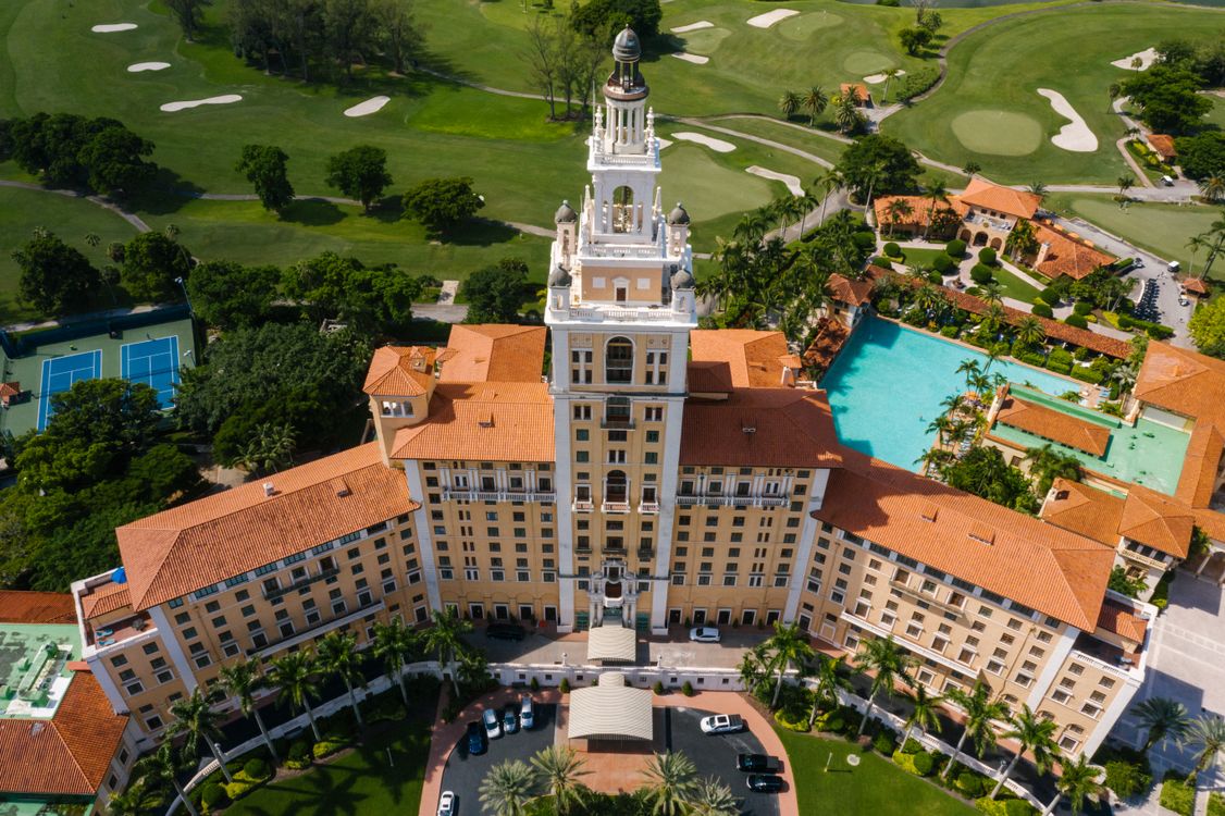 Aerial view of the historic Biltmore Hotel in Coral Gables, a symbol of Miami's luxury market where the typical top-tier home costs $4.9 million