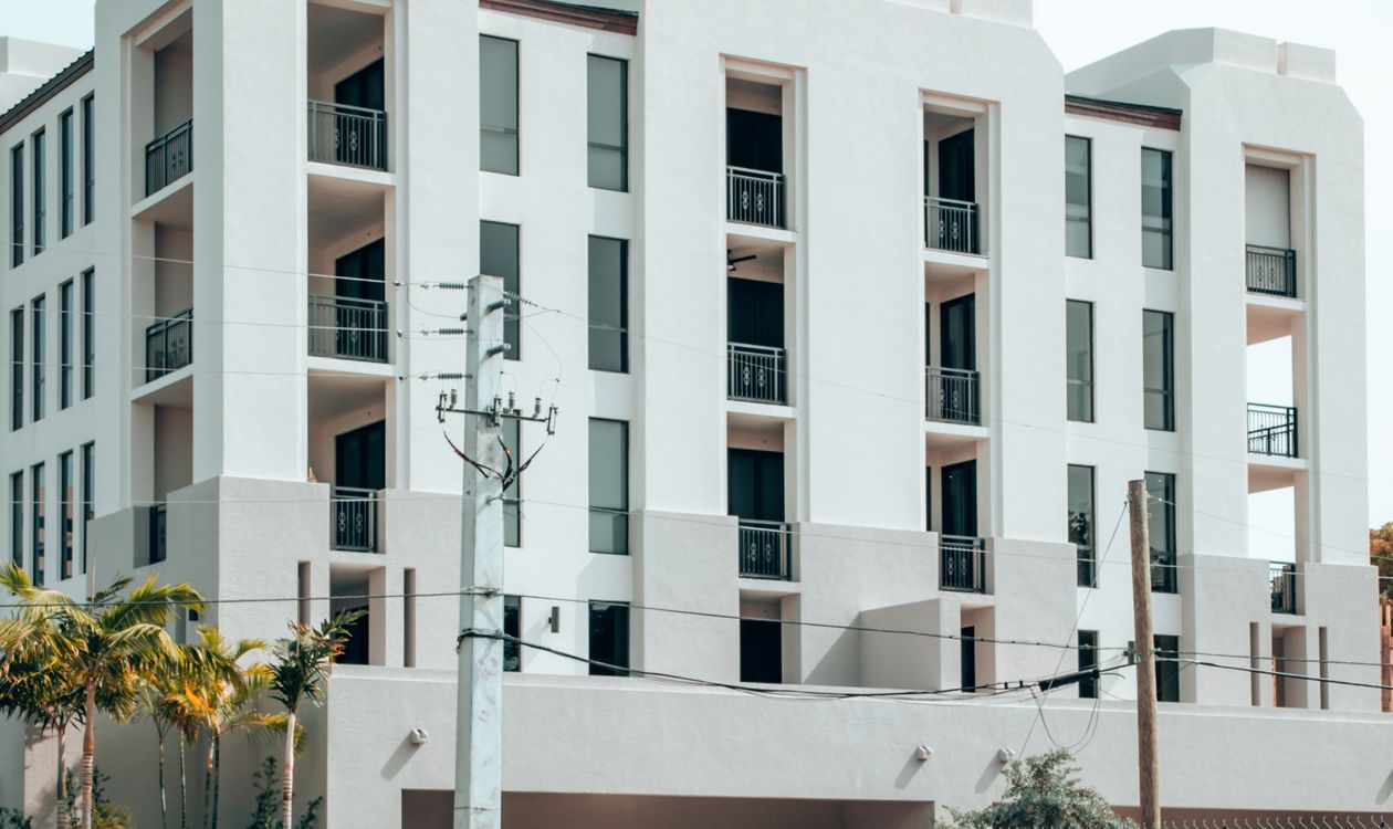 Mid-rise condominium building with balconies in Coral Gables, Florida