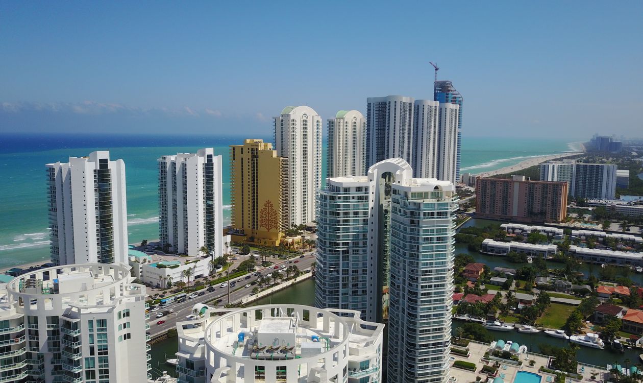 Aerial view of oceanfront condominium towers at Sunny Isles Beach, Florida