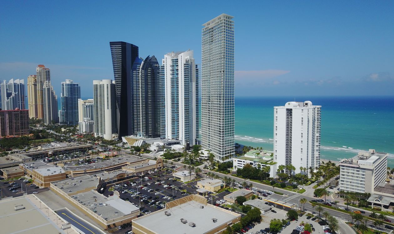 Aerial view of oceanfront condominium towers at Sunny Isles Beach, part of the 2,397 South Florida condo buildings affected by the lending change