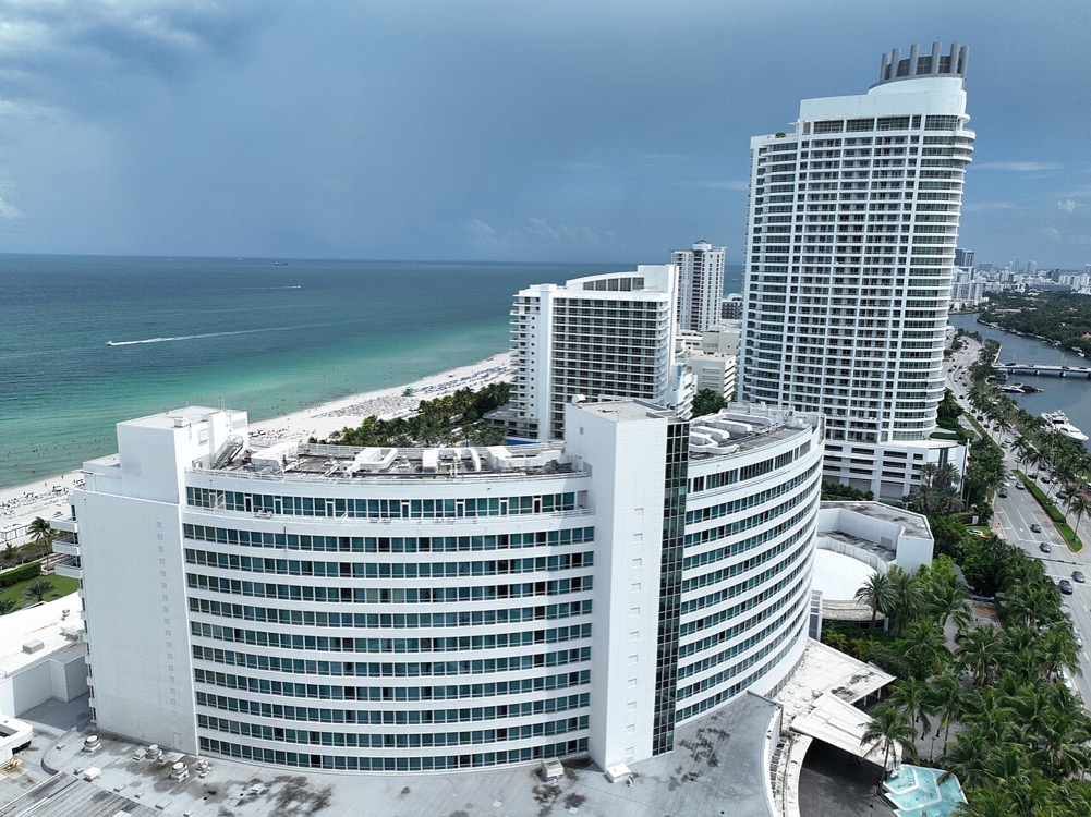 Aerial view of oceanfront condominium towers and the Atlantic on Miami Beach, Florida