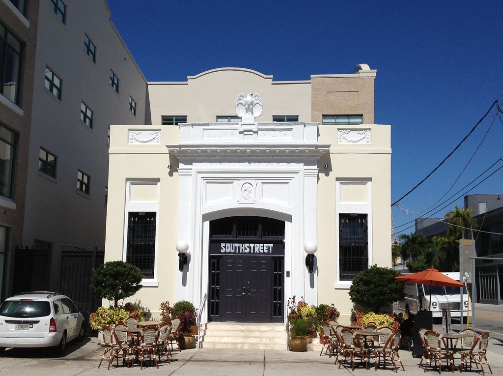 Historic Buena Vista post office building with sidewalk cafe seating in the Miami Design District