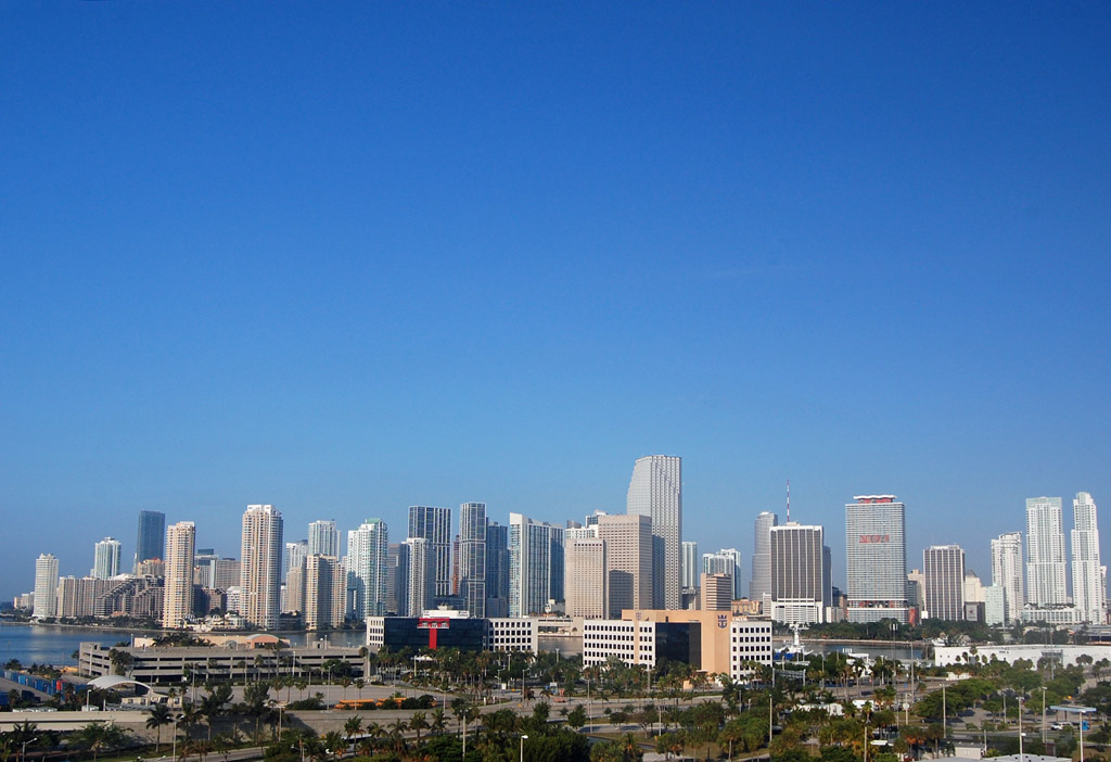 Wide view of the downtown Miami and Brickell skyline of high-rise towers seen across Biscayne Bay