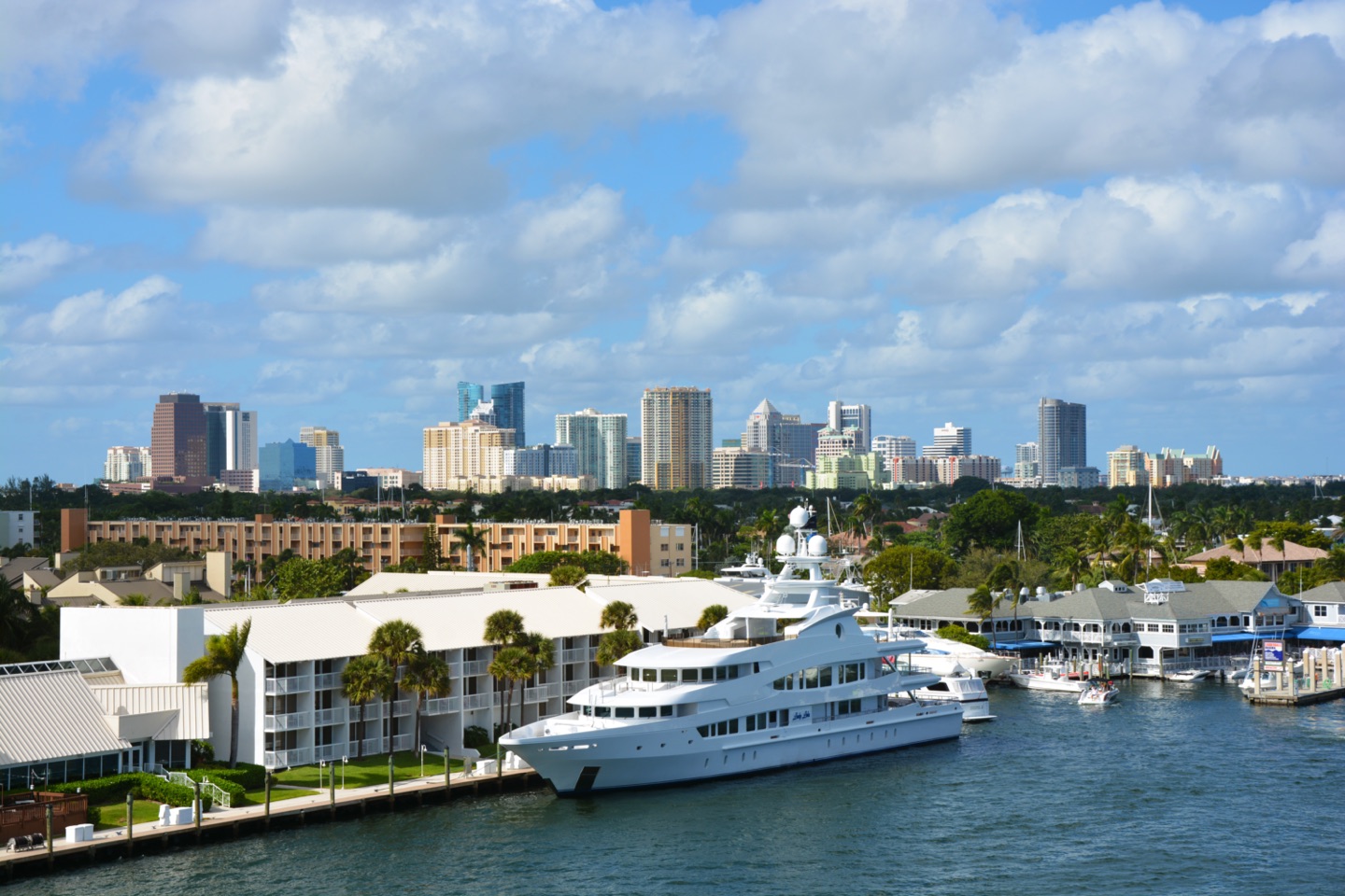 The Fort Lauderdale skyline seen over the Intracoastal Waterway with a yacht moored in the foreground