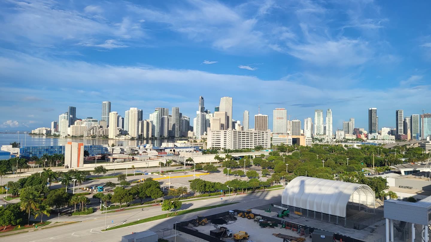 Downtown Miami and Brickell skyline on a clear day with the completed tower wall along Biscayne Bay