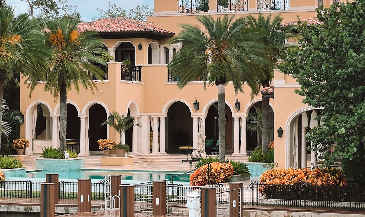 Miami Shores waterfront luxury estate with Mediterranean architecture, dock, and pool