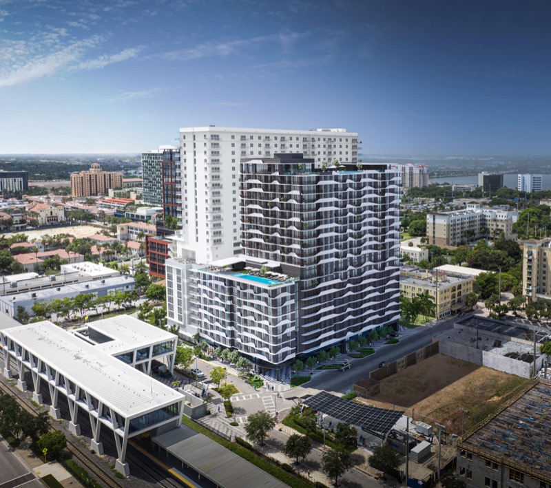 Render aéreo de Alida Residences West Palm Beach, torre de 21 pisos orientada al transporte en 506 Datura Street de LD&D e IGEQ