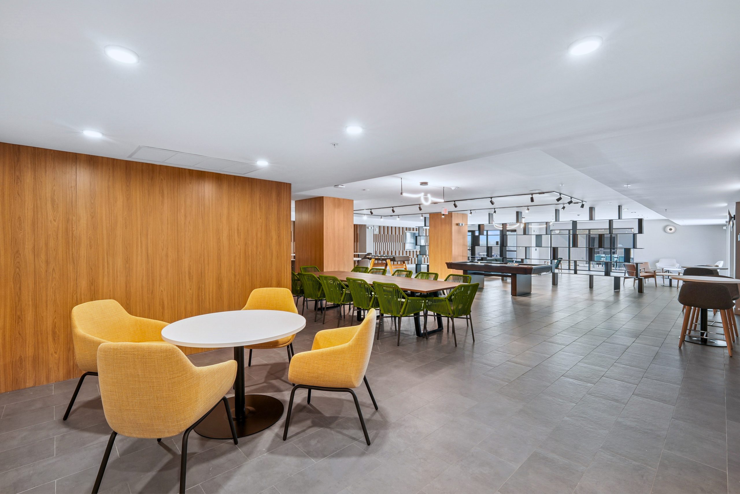 Metro Parc Hialeah clubhouse rendering with lounge seating and coworking areas