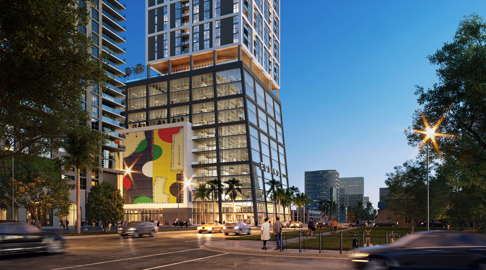 Renderizado nocturno de Neo Edgewater a nivel de calle sobre Biscayne Boulevard, con su mural y su podio de oficinas de vidrio